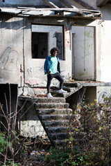Young Man Posing at Ruins Ruined House