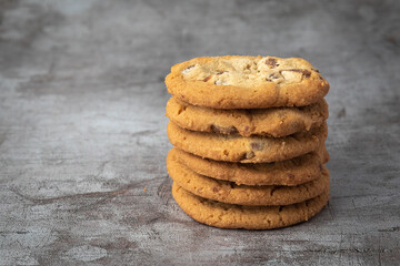 Cookies stacked with a neutral colored background