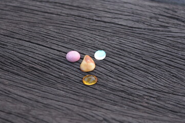 various agate on black ironwood