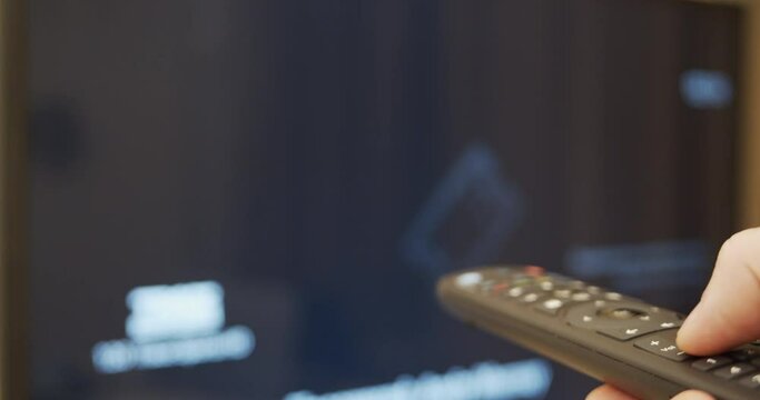 Controlling tv with remote - close-up