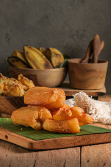Fried Cassava served on wooden table