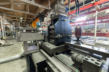 Roller forming machine. The interior of the plant producing a metal profile.