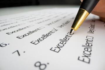 Close-up view of completing an evaluation form