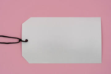 Multiple blank white tag price on  pink background