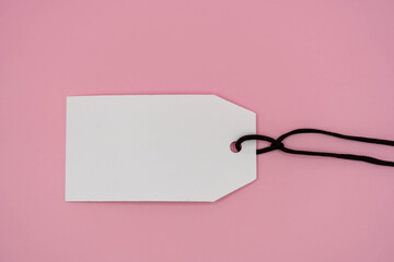 Multiple blank white tag price on  pink background