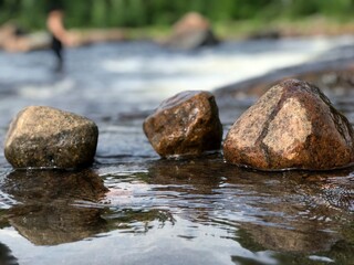 Obraz na płótnie Canvas Close-up Of Rocks In River