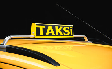 Turkey taxi called Taksi. Yellow taxi car roof sign in turkey waiting for customers or Taksi the...