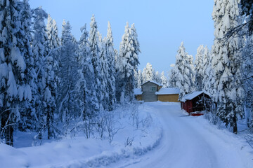 Russia,Republic Of Karelia,Kostomuksha. The road leads to small houses.February, 10.2021.