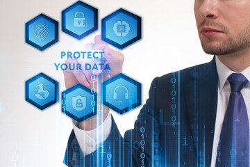 Business, Technology, Internet and network concept. Young businessman working on a virtual screen of the future and sees the inscription: Protect your data
