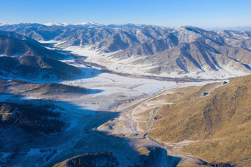 Aerial view altai landscape from Chike-Taman pass on sunny winter day. Altai Republic, Siberia,...