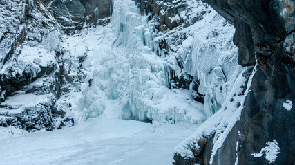 Fototapeta na wymiar Frozen Kurkure waterfall (icefall). Chulyshman river valley, Altai Republic, Russia.