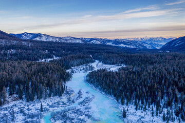 Sunrise above Multa river in winter. Altai Republic, Siberia, Russia.