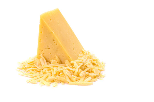 Solid yellow gouda cheese, close-up, isolated on a white background.selective focus.
