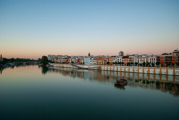 Fototapeta na wymiar the triana district in Seville at dawn