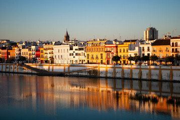 dawn in the district of triana by the Guadalquivir river in Seville
