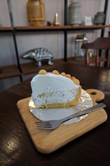 Coconut mousse pie with macadamia nuts on top