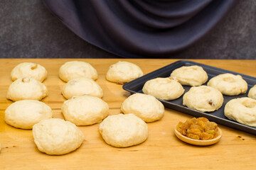 dough pieces for making buns, pies, donuts Cooking process with yeast dough.