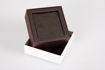 empty brown open small Gift Box with White cower in grey background