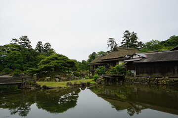 Japanese garden and Moat at Hikone castle in Shiga Prefecture, Japan - 彦根城 お堀 城壁 日本 滋賀