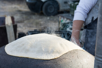 Traditional Druze Pita bread, baked on a Saj or Tava, on open fire