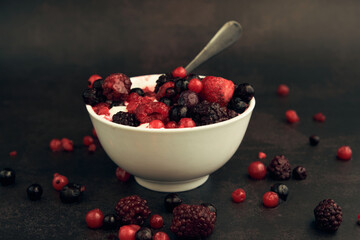 natural yogurt and red berries