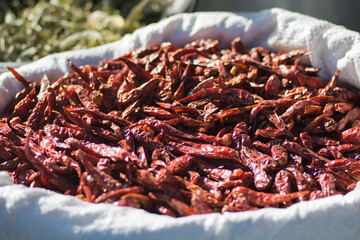 Fototapeta premium Dried Red Chili peppers, presented for sale in the market