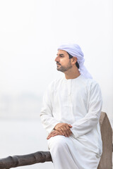 Fototapeta na wymiar arab man in traditional clothing in Shindagha district of Dubai