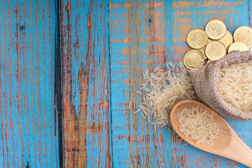Coins and Rice. Zakat concept. Zakat is a form of alm-giving as a religious obligation