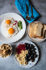 Healthy breakfast food ingredients on a background. Close up, selective focus.