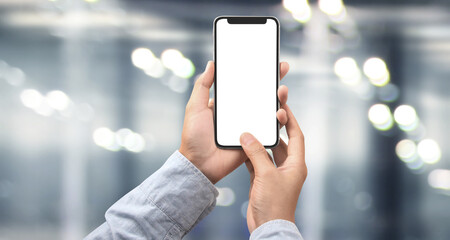 Hand holding smartphone device touching screen