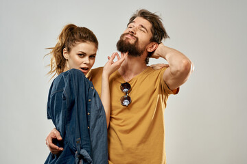 Young couple lifestyle emotions communication fashion light background