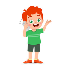 cute little boy talk using mobile phone
