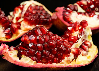 juicy slices of red pomegranate