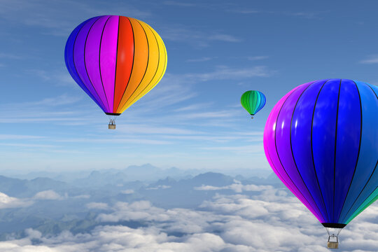 広い青空にレインボーの大きな気球が３つ雲より高いところに浮かぶ