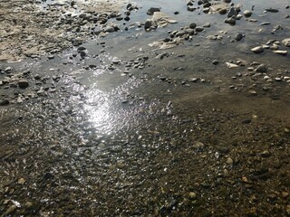 Beautiful river flows and pebbles
