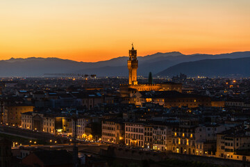 Fototapeta na wymiar Cityscape of Florence at sunset with mountains