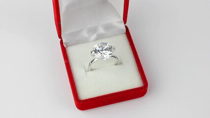 rotating ring with big diamond in jewelry gift box 