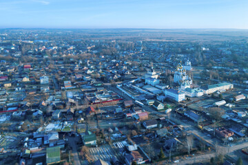 Tilt-shift aerial view of the town and St. Nicolas monastery (Nikolsky monastery) at sunny winter day. Pereslavl-Zalessky, Yaroslavl Oblast, Russia.