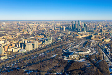 Fototapeta na wymiar Aerial view of the city, Victory park and Moscow city at sunny winter day. Moscow, Russia.