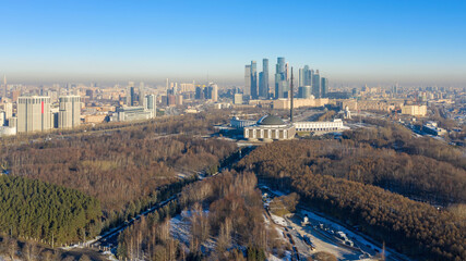 Obraz na płótnie Canvas Aerial view of Moscow, Victory park and Moscow city at sunny winter day. Russia.