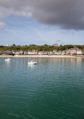 Fototapeta premium Cancale, fishing port and famous oysters production town located at the western end of the bay of Mont Saint-Michel on the Emerald Coast, Brittany, France