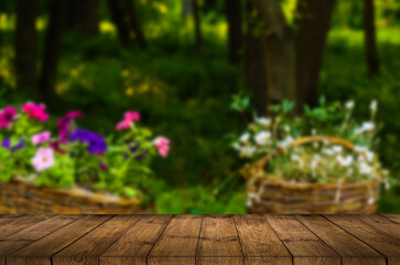 Empty top wooden table and flower blurred background. Can use for product display