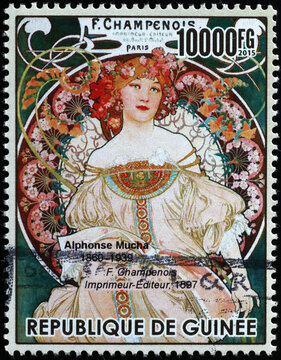 Advertising illustration by Alphonse Mucha on postage stamp