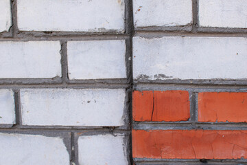 Abstract white and red brickwork composite brick background