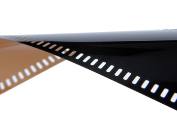 Obraz premium Old 35 mm film strip on a white background