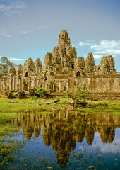 Fototapeta na wymiar Angkor Thom right side with water reflection