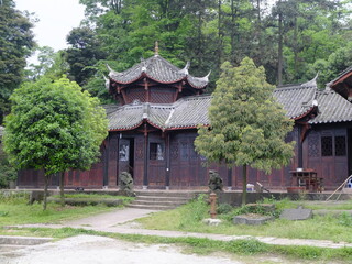 An ancient, traditional Chinese style building on the side of Mount Qingcheng, Sichuan, China