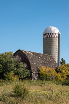 Abandoned Farm Yard With Barn And Silo