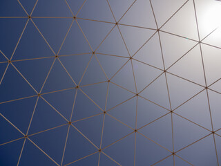 Artificial semisubmersible geodesic dome in the blue sky background in Fuerte Ventura © Demis Nave/Wirestock
