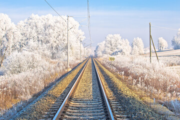 Fototapeta premium Railroad track in frost landscape view